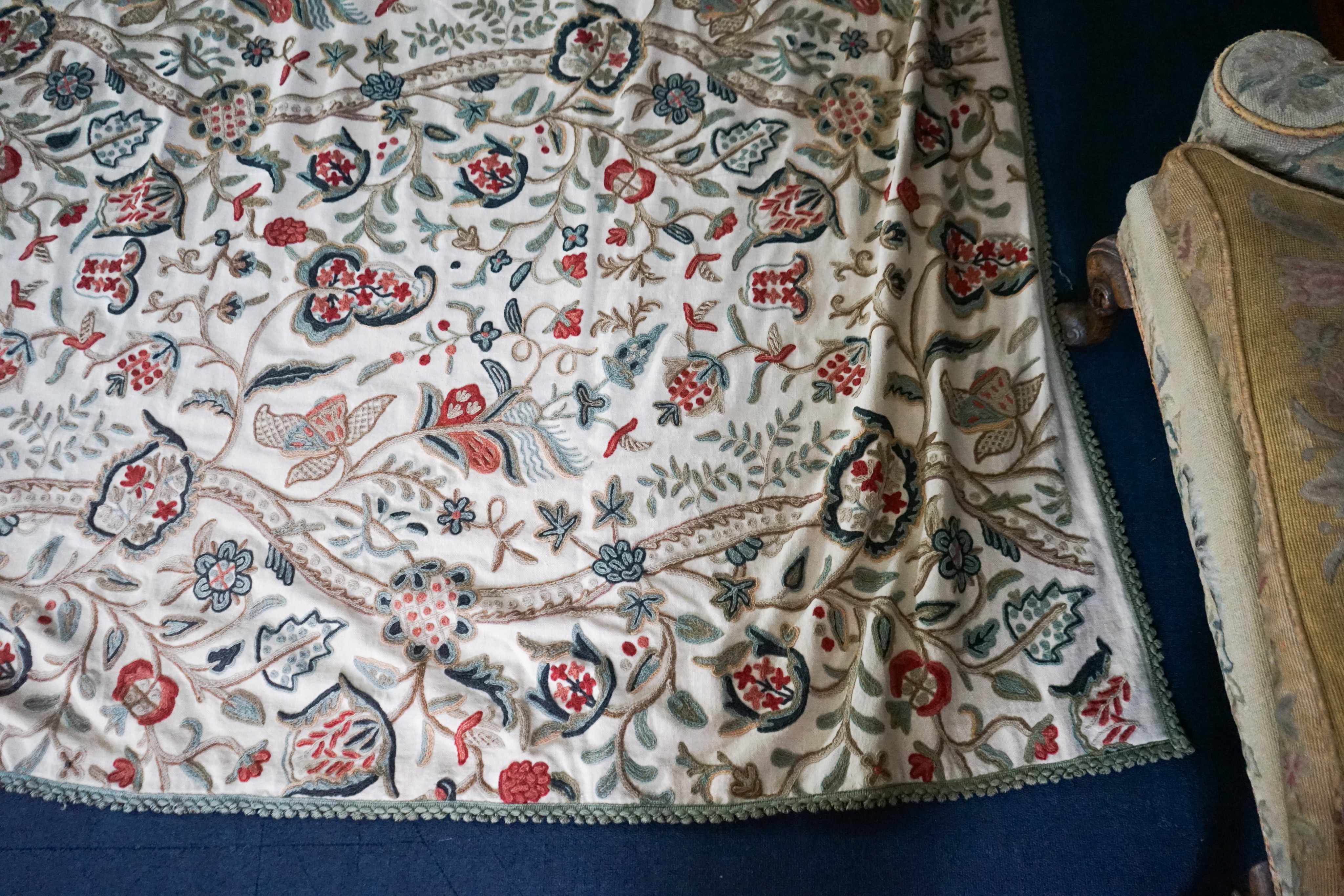 A Chelsea Textiles crewel work double bed spread, 550 x 260cm